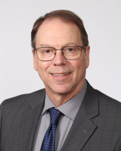 Dr. W Charles Huskins